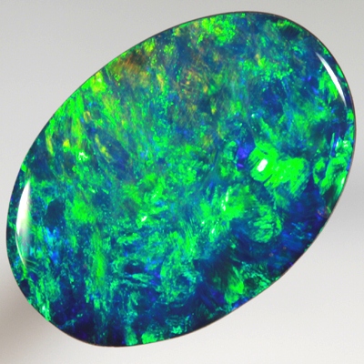 TOP QUALITY LIGHTNING RIDGE OPAL DOUBLET Golden greens over deep blue SEE VIDEO
